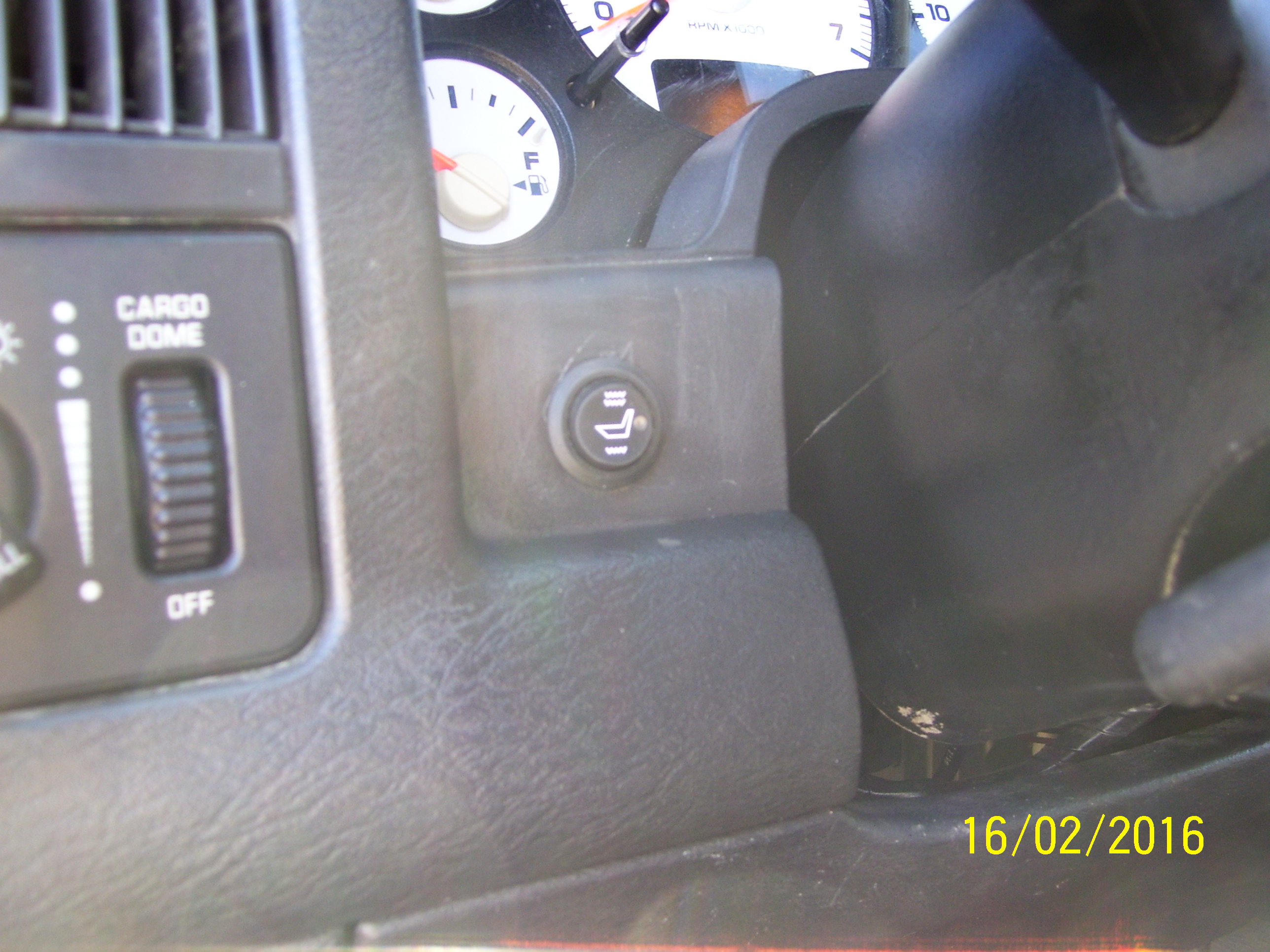 Attached picture seat heater button 001.JPG